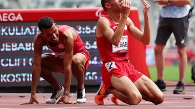 Tokyo 2020 Paralympic Games - Athletics - Men's 1500m - T13 Final - Olympic Stadium, Tokyo, Japan - August 31, 2021. Rouay Jebabli of Tunisia reacts after winning silver REUTERS / Athit Perawongmetha