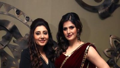 Archana Kochhar (8:30pm on Friday): Couturier Archana Kochhar, left, has been sending her creations down runways for more than a decade. Her style is characterised by classic Indian silhouettes and attention to handcraftsmanship, with her bridalwear in particular. Look out for draped lehengas, saris and luxe gowns at India Fashion Week on Friday. AFP photo