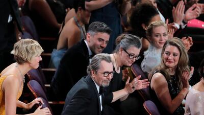 Gary Oldman rises to accept the Oscar for Best Actor for 'Darkest Hour.' Lucas Jackson / Reuters