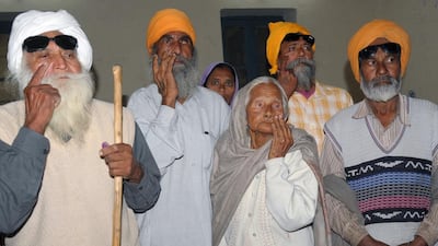 The recent cases of people who lost their sight after undergoing free cataract surgery at a camp in northern India highlights the country's deep problems. (AFP/Narinder Nanu)