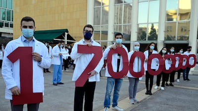 Medical students at the American University of Beirut (AUB) shout slogans during a protest against the adjustment of the dollar rate for new tuition fees in Beirut, Lebanon. EPA