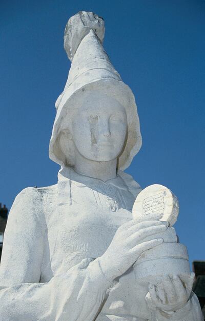 Marie Harel (1761-1812) is said to have invented camembert cheese. A statue of Harel can be found in Vimoutiers. Getty Images.