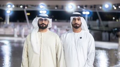 Adel, left, and Yousaf Ismail Mohammed Alblooshi on Commemoration Day at Wahat Al Karama in Abu Dhabi