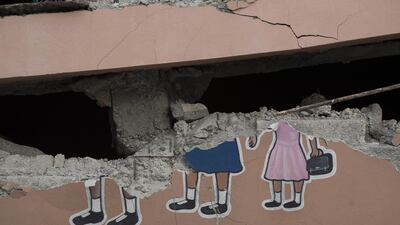 A view of the wall of a school which was destroyed in Gros Morne. EPA