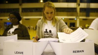 A workers counts ballots after polling stations closed in the Referendum on the European Union in Islington, London. Neil Hall / Reuters