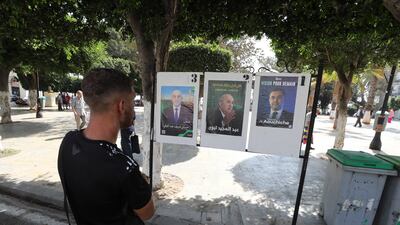 Campaign posters line the streets of Algiers ahead of Saturday's presidential election. EPA
