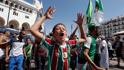 Algerian demonstrators take to the streets in the capital Algiers to protest against the government. Toufik Doudou / AP