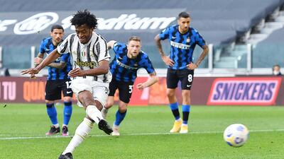 Juan Cuadrado scores Juventus' third goal from the spot. EPA