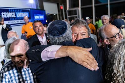 Westchester County Executive George Latimer embraces a supporter at his election night party on June 25 in White Plains, New York. AP