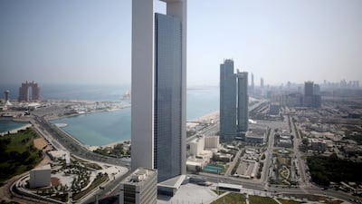 Adnoc headquarters in Abu Dhabi. Adnoc raised the stake being offered in its marine and logistics unit to 19 per cent, from 15 per cent, earlier this week. Reuters