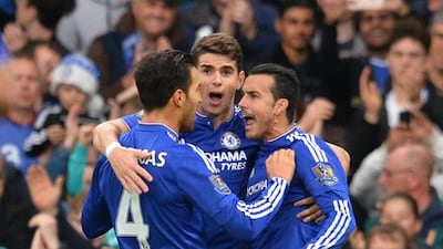 Chelsea celebrate Pedro's goal. AFP