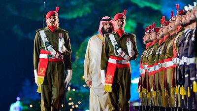 Mohammad bin Salman inspects a guard of honour in Islamabad. EPA