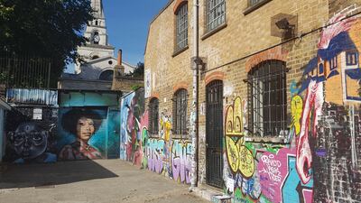 A back alley in Shoreditch covered in street art. Photo by Rosemary Behan