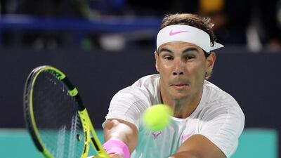 Rafael Nadal plays a return.