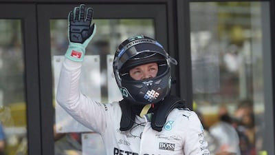 Nico Rosberg salutes the crowd after clinching pole for the Spanish Grand Prix - his first of the season. Lluis Gene / AFP