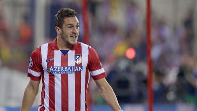 Atletico Madrid midfielder Koke celebrates after scoring during his side's Champions League victory over Barcelona on Wednesday. Dani Pozo / AFP / April 9, 2014