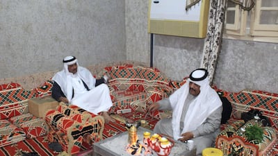 Bedouin men talk after Iftar in the Sinai. Yusri Mohammad