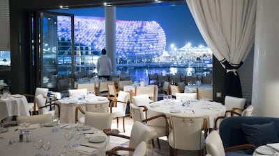The terrace of the Italian restaurant Cipriani, on Yas Island, offers a glimpse of the circuit. The venue continues to be popular among celebrities. Courtesy Yas Marina Circuit