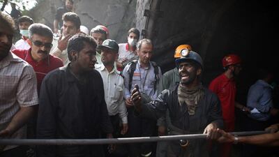 Coal miners and rescue workers gather at the scene following an explosion at a mine in Azadshahr, northern Iran, on May 3, 2017. Mostafa Hassanzadeh / Tasnim News / AFP