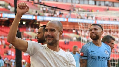 Manchester City manager Pep Guardiola celebrates after winning the FA Community Shield match against Chelsea at Wembley Stadium. EPA