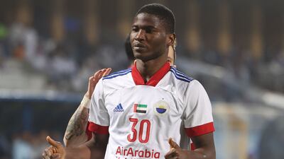 Sharjah forward Ousmane Camara celebrates his opening goal against Hilal.