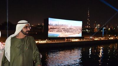 A film titled ‘Dubai Water Canal, the New Face of Dubai’ showing various stages of project during construction is screened at the opening of the Dubai Canal. Wam