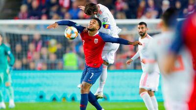 Spain's defender Sergio Ramos (Up) and Norway's forward Joshua King vie for the ball during the Euro 2020 qualifying football match Norway v Spain in Oslo, Norway. AFP