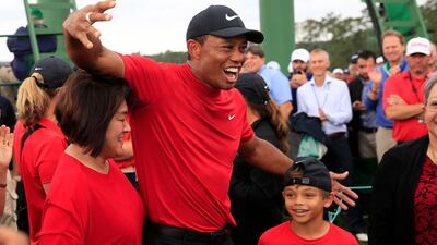 epaselect epa07507095 Tiger Woods of the US celebrates with family after winning the 2019 Masters Tournament at the Augusta National Golf Club in Augusta, Georgia, USA, 14 April 2019. The 2019 Masters Tournament is held 11 April through 14 April 2019. EPA/TANNEN MAURY