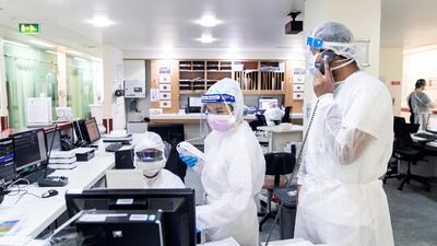 Healthcare workers at the emergency ward in Sheikh Khalifa Medical City. Reem Mohammed / The National