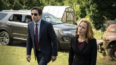 David Duchovny, left, as Fox Mulder, and Gillian Anderson as Dana Scully, in the Founder's Mutation season premiere of The X-Files. Ed Araquel / FOX via AP