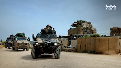 Army vehicles at the Qasrak base in Syria's north-eastern countryside. Photo: Sana