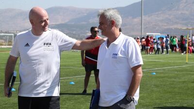 Fifa President Gianni Infantino and Jose Mourinho. AFP