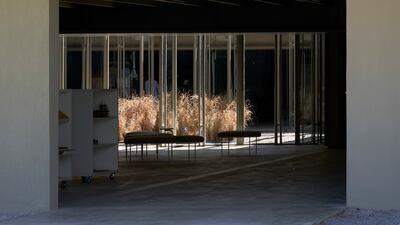 The blank facades reveal a beautiful interior space lit by a square atrium.