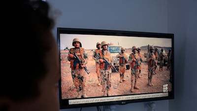 Yemeni fighters are shown in a TV broadcast. Battles between government forces and the Houthis have escalated. EPA