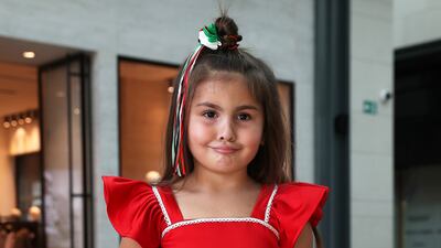 Ameera Al Maliki , 4, was among the young revellers to visit City Walk during the National Day holiday. Pawan Singh / The National
