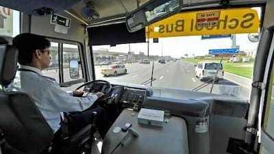 Rajeev Rajan, a bus driver, on Sheikh Zayed Road. Even when we stop to pick up children, drivers keep honking, he says. Charles Crowell / The National