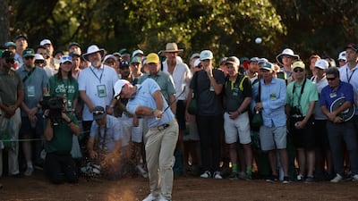 Northern Ireland's Rory McIlroy hits his approach from the pine straw on the 18th hole during the final round. Reuters