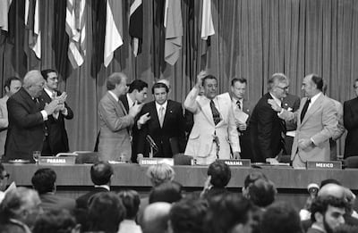 Then US president Jimmy Carter applauds and Gen Omar Torrijos waves after the signing and exchange of treaties in Panama City on June 16, 1978. AP