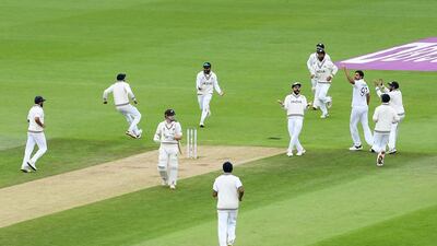 India bowler Ishant Sharma celebrates after taking the wicket of Henry Nicholls for seven. Getty