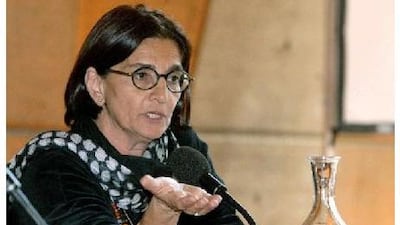 Selma al Radi speaking during a press conference in Paris in 2003 about restoration plans for Iraq's cultural heritage