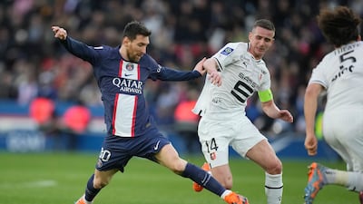 PSG's Lionel Messi challenges for the ball with Rennes' Benjamin Bourigeaud. AP Photo