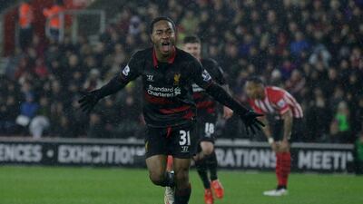 Liverpool’s Raheem Sterling celebrates after scoring their second goal in a 2-0 Premier League win against Southampton on Sunday. Tim Ireland / AP