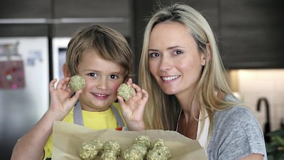Dubai resident Gemma McQueen with her son Arlo, 4. She says organic food can cost almost three times as much as non-organic. Chris Whiteoak / The National