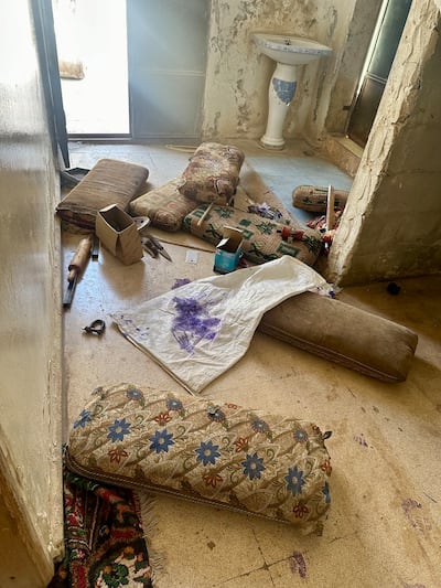 A family's possessions lie scattered across the floor after their home in Arza, a village in the countryside of Syria's Hama province, was looted. Nada Atallah / The National