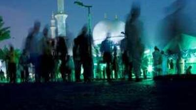 Muslims leave after iftar at the Sheikh Zayed Grand Mosque in Abu Dhabi.