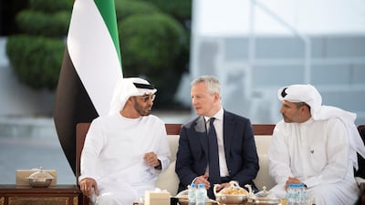 Sheikh Mohamed bin Zayed meets Bruno Le Maire, Minister of Economy and Finance of France, centre, during a Sea Palace barza. Seen with Khaldoon Al Mubarak, CEO and Managing Director of Mubadala. Ministry of Presidential Affairs ---