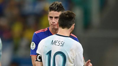 Colombia's James Rodriguez, left, and Argentina's Lionel Messi greet each other at the end of their Copa America match. AFP