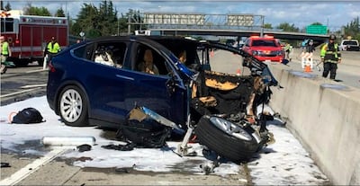 The aftermath of the crash of a Tesla Model X in Mountain View California that killed an Apple engineer when autopilot was engaged, killing the driver. AP