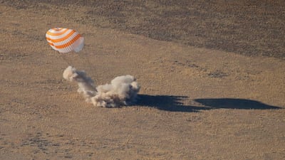 The Russian Soyuz MS-12 space capsule lands about 150km south-east of the Kazakh town of Zhezkazgan. AP Photo