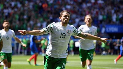 Robbie Brady celebrates scoring the opening goal from the penalty spot. Laurence Griffiths / Getty Images